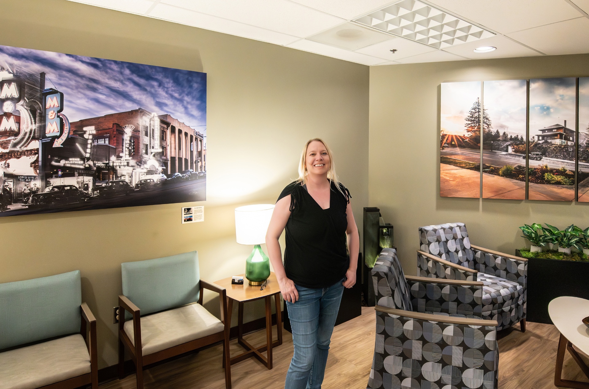 Lisa Wareham standing among her Time Travel artwork installations